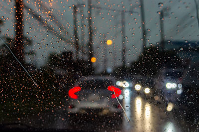 Wet glass window in rainy season