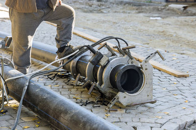 Low section of man working at construction site