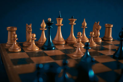 Close-up of chess pieces on table