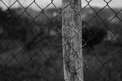 Chainlink fence seen through chainlink fence