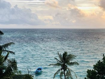 Scenic view of sea against sky at sunset