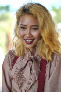 Portrait of a smiling young woman