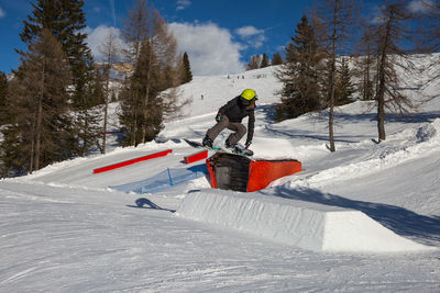 Person skiing on snow covered land