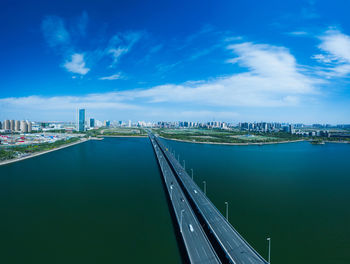 High angle view of bridges over river in city