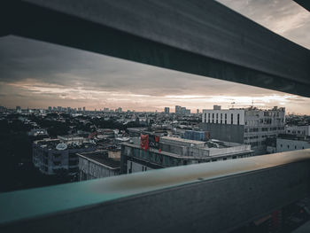 High angle view of buildings against sky during sunset