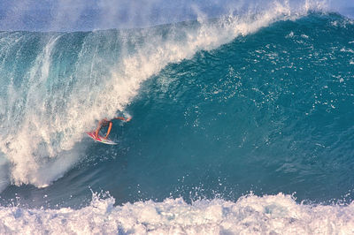 High angle view of person surfing in sea