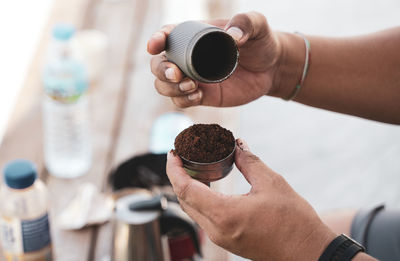 Cropped hand of woman holding hands