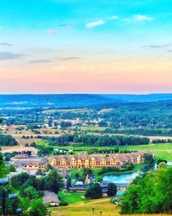 High angle view of city at sunset