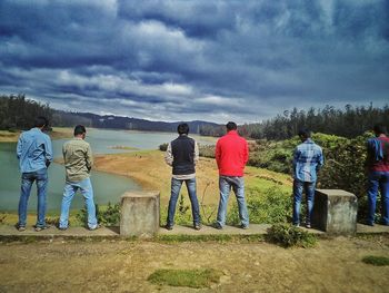 Scenic view of landscape against cloudy sky