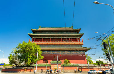 Low angle view of building against clear blue sky