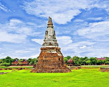 Temple against cloudy sky