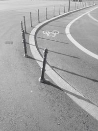 High angle view of bollards on road