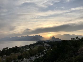 Scenic view of mountains against sky during sunset