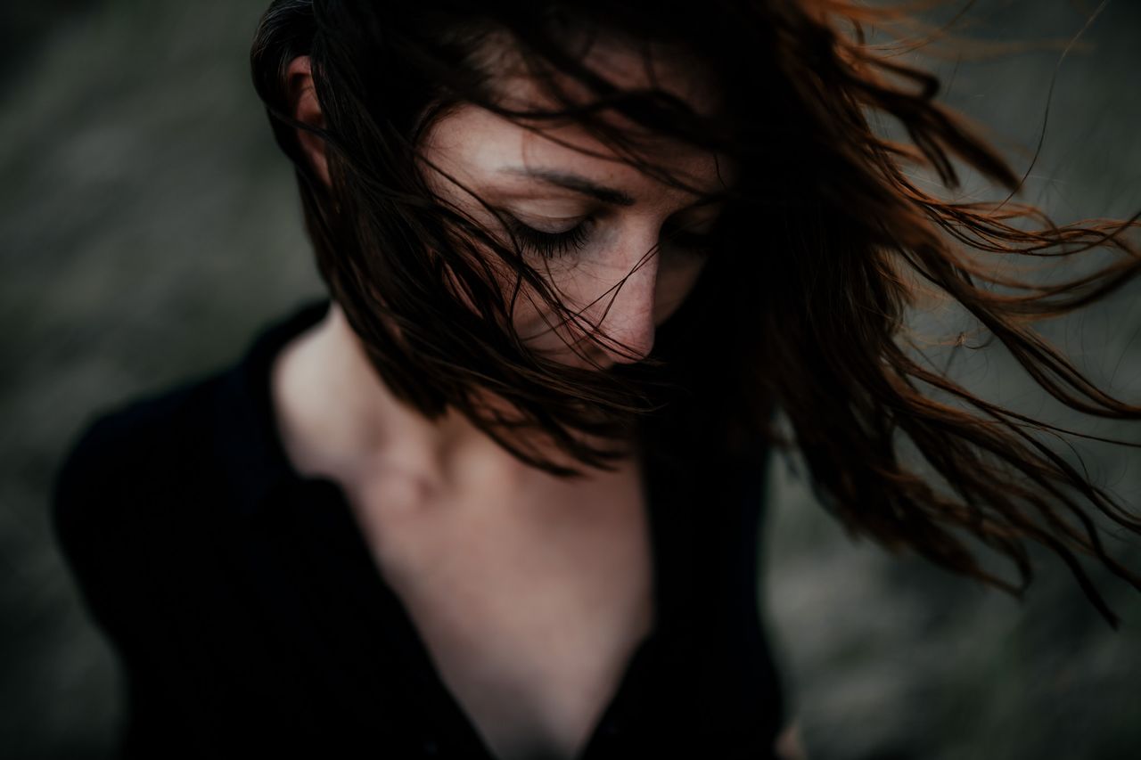 one person, young women, young adult, real people, women, hair, portrait, front view, long hair, headshot, lifestyles, hairstyle, leisure activity, adult, tousled hair, brown hair, looking at camera, close-up, human hair, beautiful woman, wind, human face, contemplation