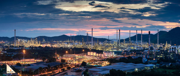 Beautiful sunset petrochemical oil refinery factory plant , cityscape of chonburi thailand at night 