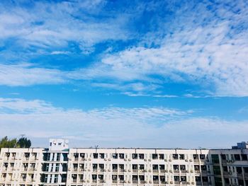 White buildings against blue sky during sunny day