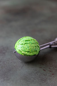 Close-up of green balls on table