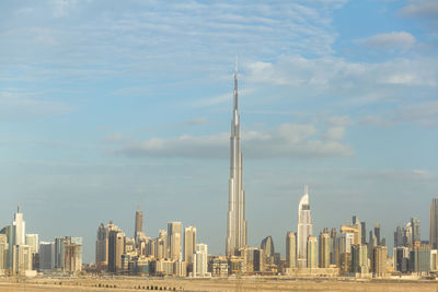 Modern buildings in city against sky