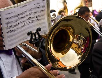 Man playing trumpet at orchestra