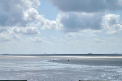 Scenic view of sea against sky during winter