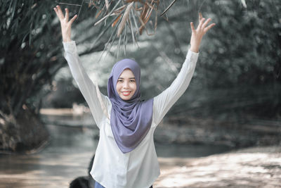 Portrait of a smiling young woman