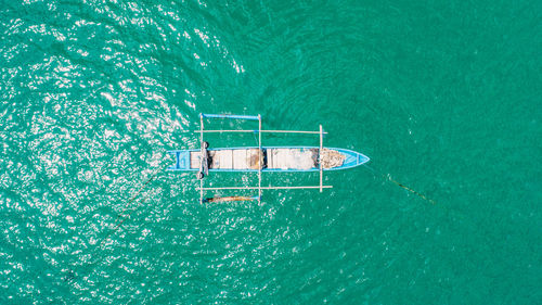 Directly above shot of boat sailing in sea