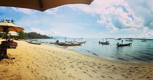 Scenic view of beach against sky