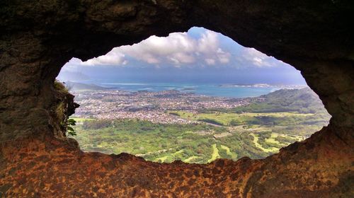 Scenic view of landscape against cloudy sky