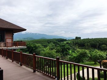 Scenic view of mountains against cloudy sky