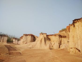 Scenic view of desert against clear sky