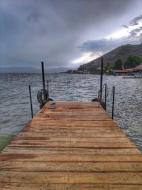 Pier over sea against sky