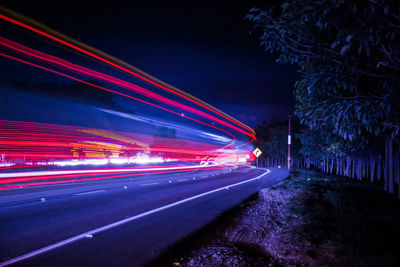 Light trails on road at night