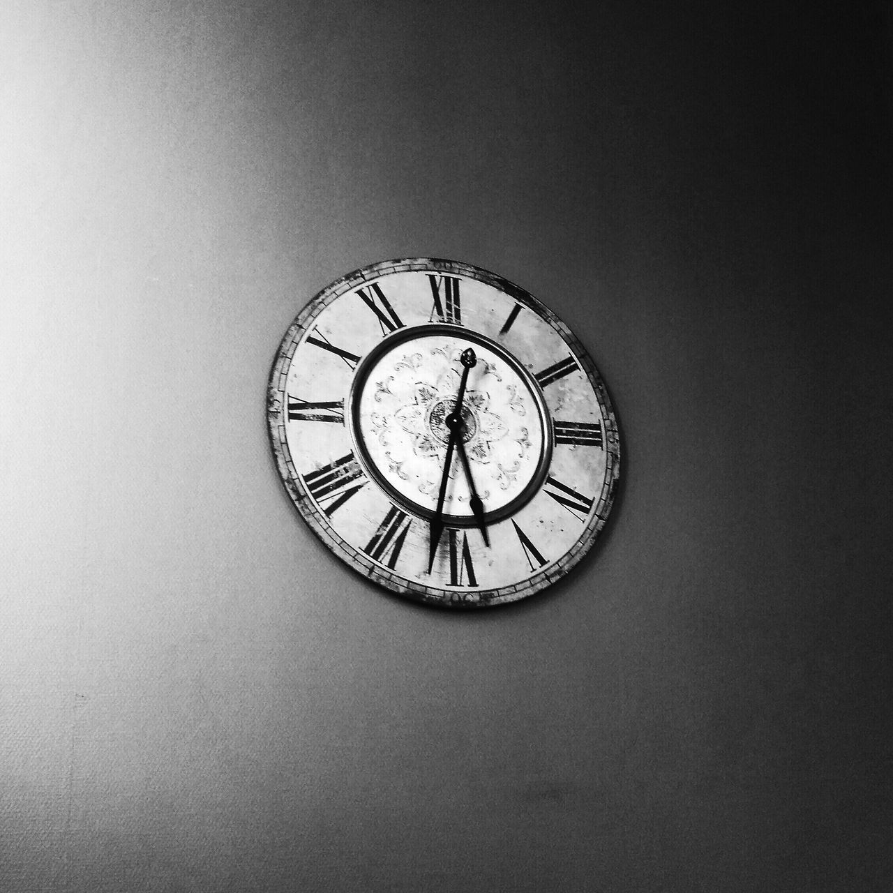 clock, time, indoors, circle, clock face, roman numeral, geometric shape, low angle view, minute hand, built structure, wall clock, architecture, directly below, number, instrument of time, clock tower, no people, wall - building feature, design, shape