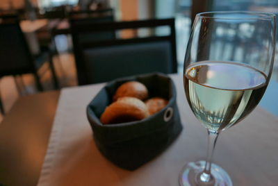 Close-up of wine in glass on table at restaurant