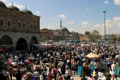 Group of people in front of historic building