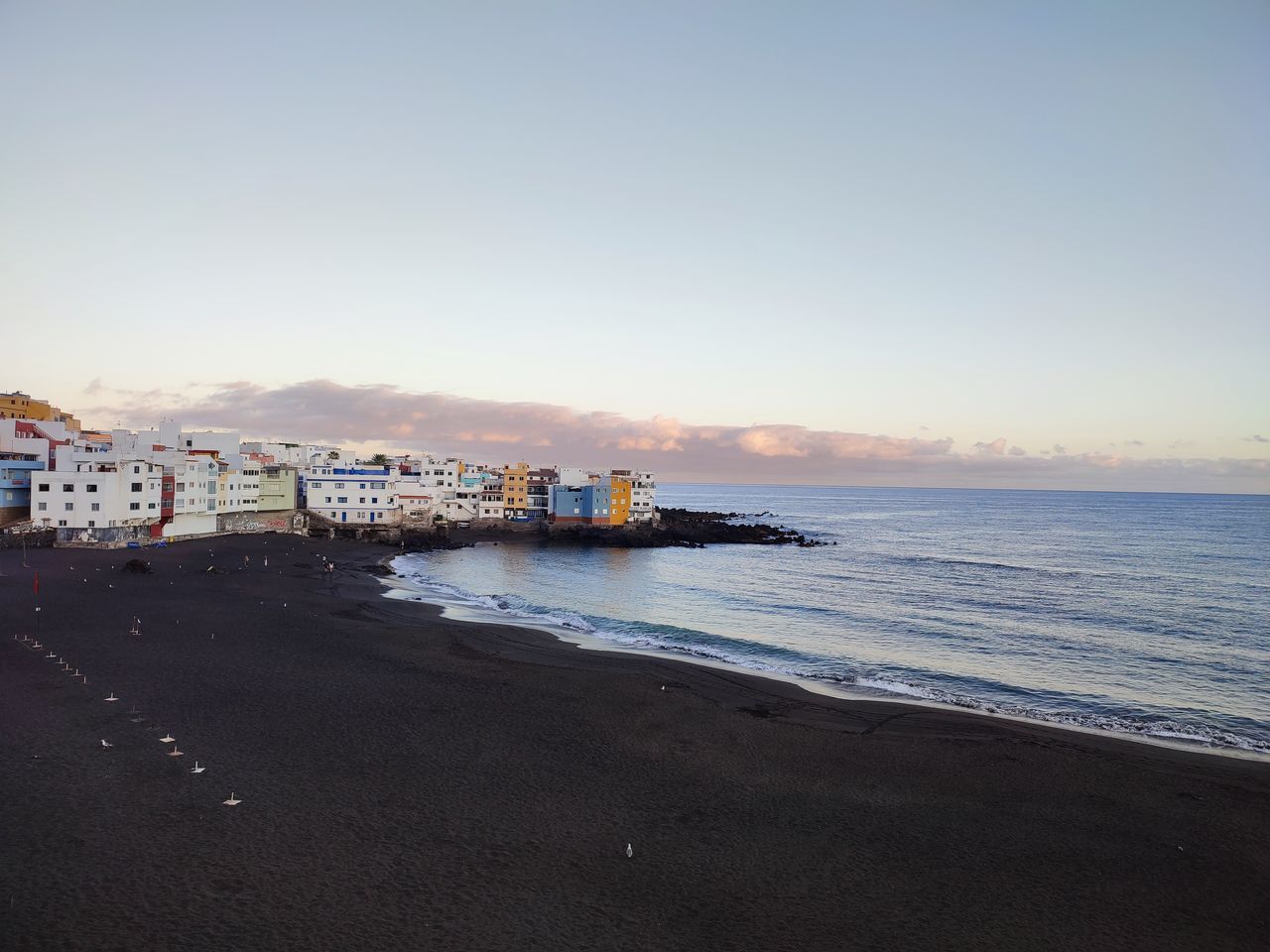 SCENIC VIEW OF BEACH AGAINST CLEAR SKY