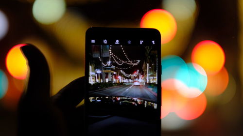 Close-up of illuminated smart phone at night