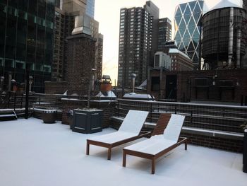 Modern buildings in city during winter