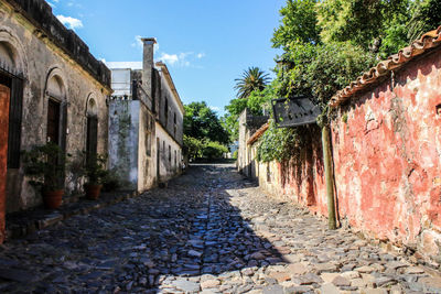 Footpath amidst old building