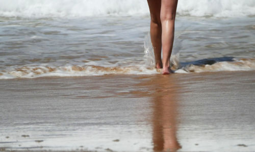 Low section of person on beach