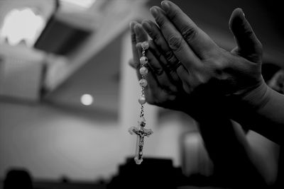Pray on rosary beads