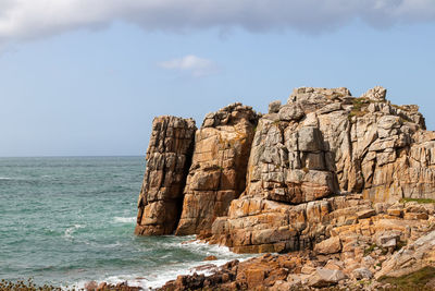 Rocky cliffs on the cote de granit rose near le gouffre in brittany, france