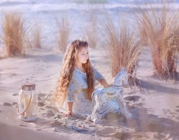 Full length of girl on sand at beach