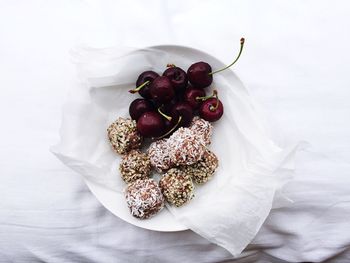 High angle view of raspberries in bowl on table