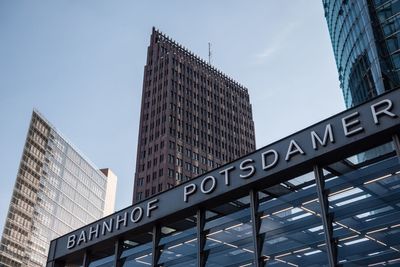 Low angle view of office building against sky