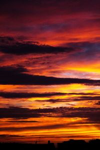 Scenic view of dramatic sky during sunset