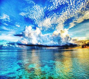 Scenic view of sea against blue sky