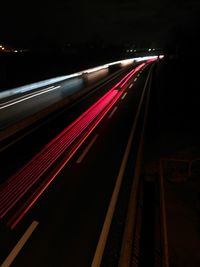 Light trails on road at night