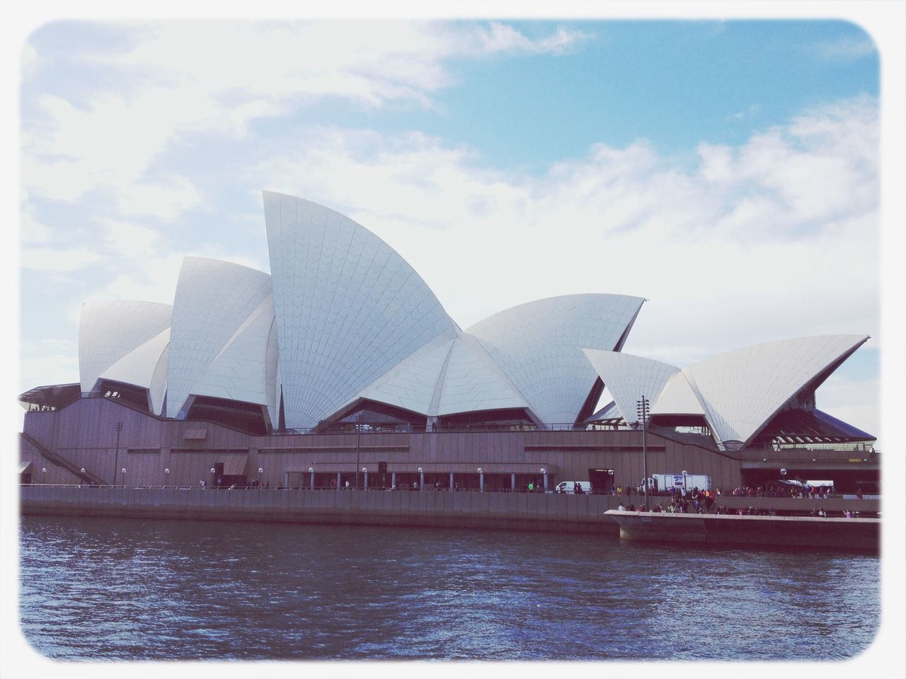 architecture, built structure, sky, building exterior, water, waterfront, transfer print, cloud - sky, auto post production filter, cloud, sea, day, outdoors, river, travel destinations, no people, reflection, city, sunlight, travel