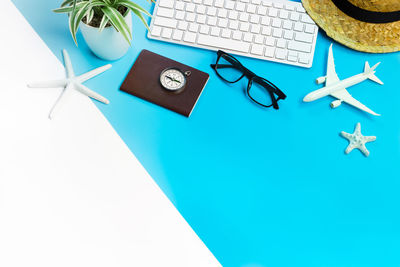 High angle view of eyeglasses and paper on table